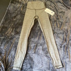 Size 2 navy green lululemon leggings. 28”